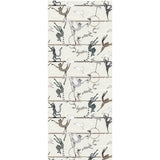 Balancing Act (Cream) wallpaper features colorful dancing monkeys and rabbits on a cream background