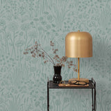 Alpine Garden Tonal (Mist) featuring hand drawn flowers in green on a dusty blue background | Schoolhouse x Hygge & West Wallpaper Collection