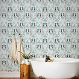 Mermaids (Ocean) wallpaper | Mermaids, fish, octopi and ships float in this charming design | turquoise and black artwork on an off white ground
