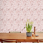 Sonoma (Blush) wallpaper with shades of mauve and taupe flowers and leaves on a pink background