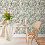 Secret Garden (White) wallpaper features shades of green, brown and pink plants, birds and butterflies on a true white background