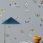 Butterflies (Mist) featuring blue, cream and lavendar butterflies on a dusty gray blue background | Nathalie Lete + Hygge & West