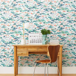 Inspired by the Fauvism movement, Plein Air brings the rolling countryside to life with a gestural brushwork technique. Its colors are joyful and bold while semi-realistic to the subject, including a range of green and blue hues with hints of coral and lavender.