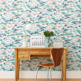Inspired by the Fauvism movement, Plein Air brings the rolling countryside to life with a gestural brushwork technique. Its colors are joyful and bold while semi-realistic to the subject, including a range of green and blue hues with hints of coral and lavender.