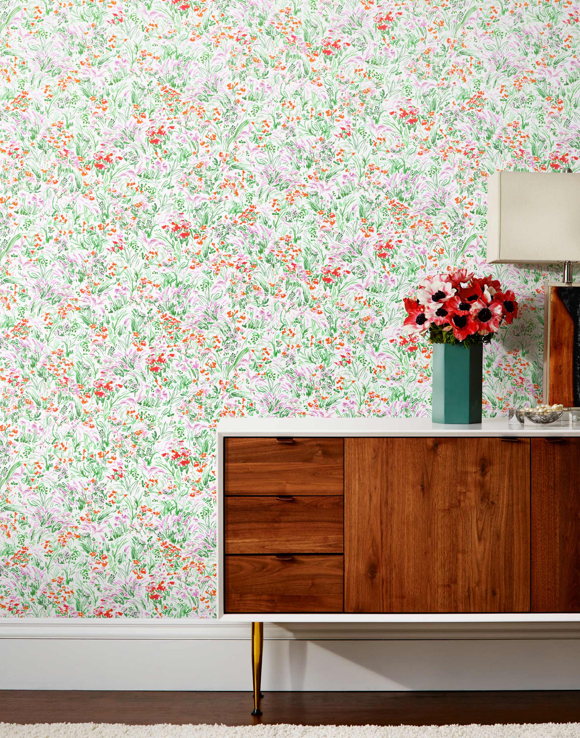 Summer (Poppy) wallpaper features loose brushstrokes that capture the movement of wild flowers and grasses swaying in the breeze. Bright red, lavender purple, and green watercolored flora on a white background | Hygge & West