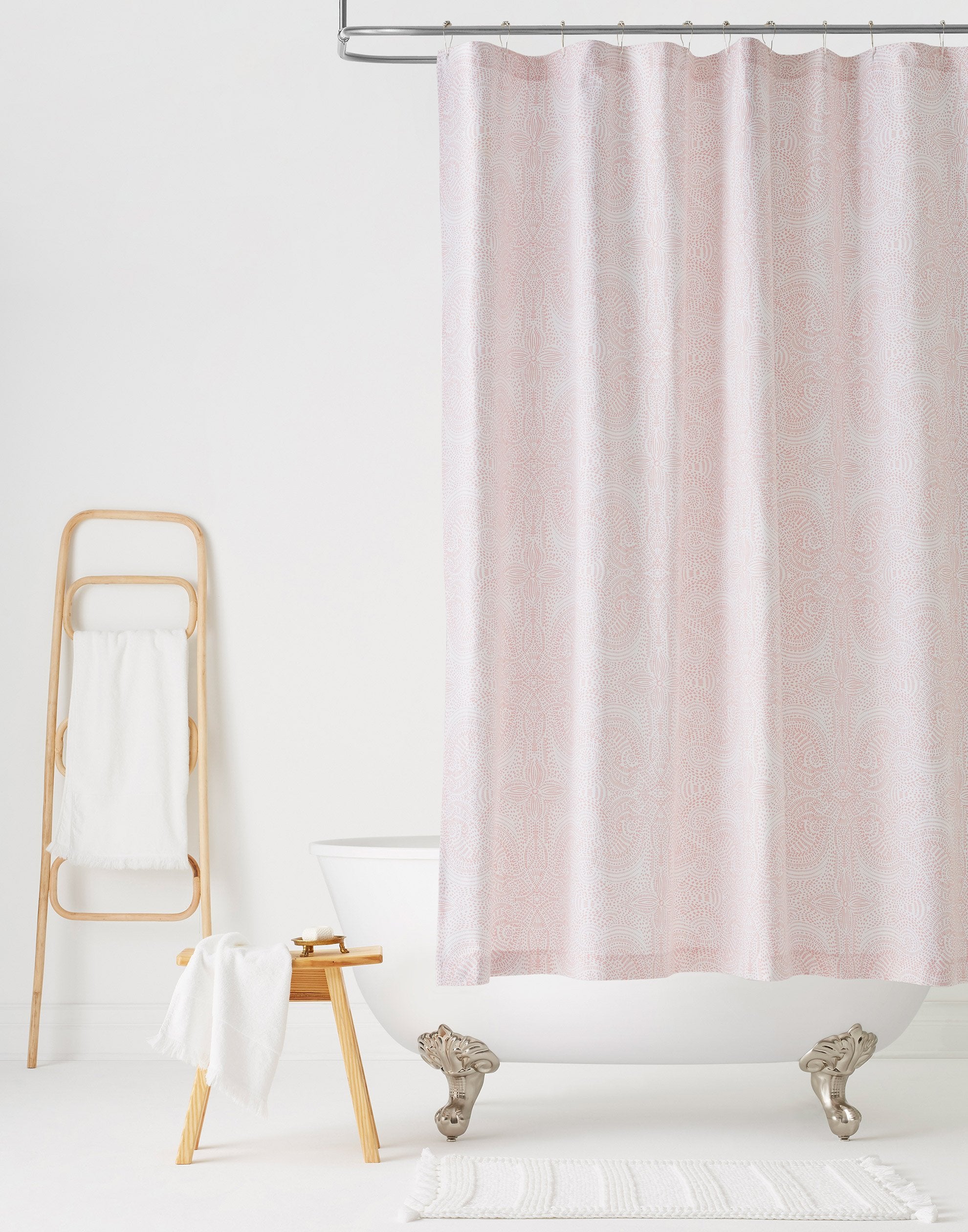 Andanza Shower Curtain featuring a delicate pattern created using a stippling technique in rose pink on white